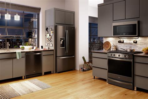 black stainless steel appliances in cherry color cabinets|black stainless steel kitchen cabinet colors.